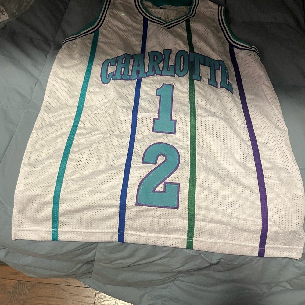 Muggsy Bogues & Larry Johnson Signed Jersey (AWM)